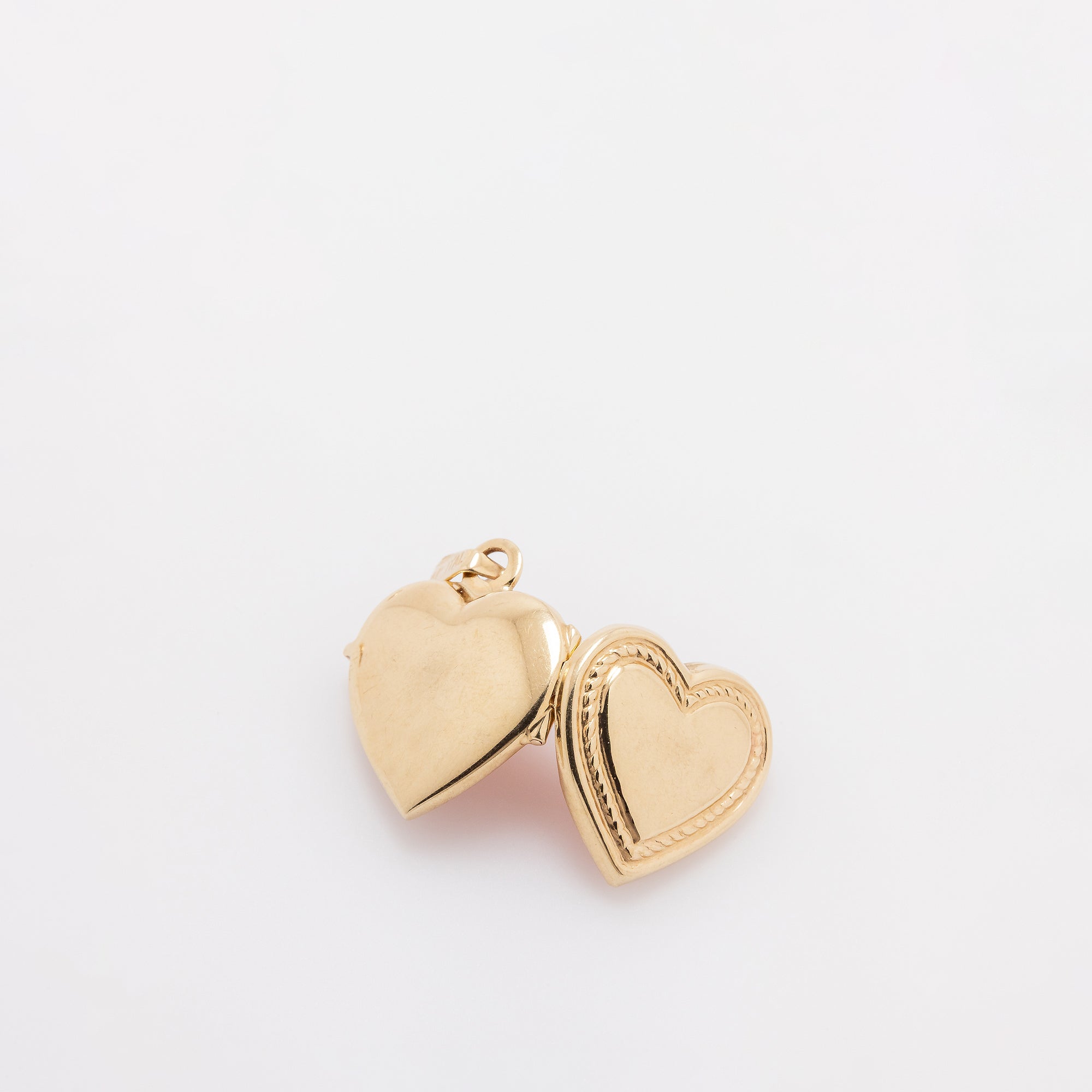 Braided Border Heart Locket Pendant