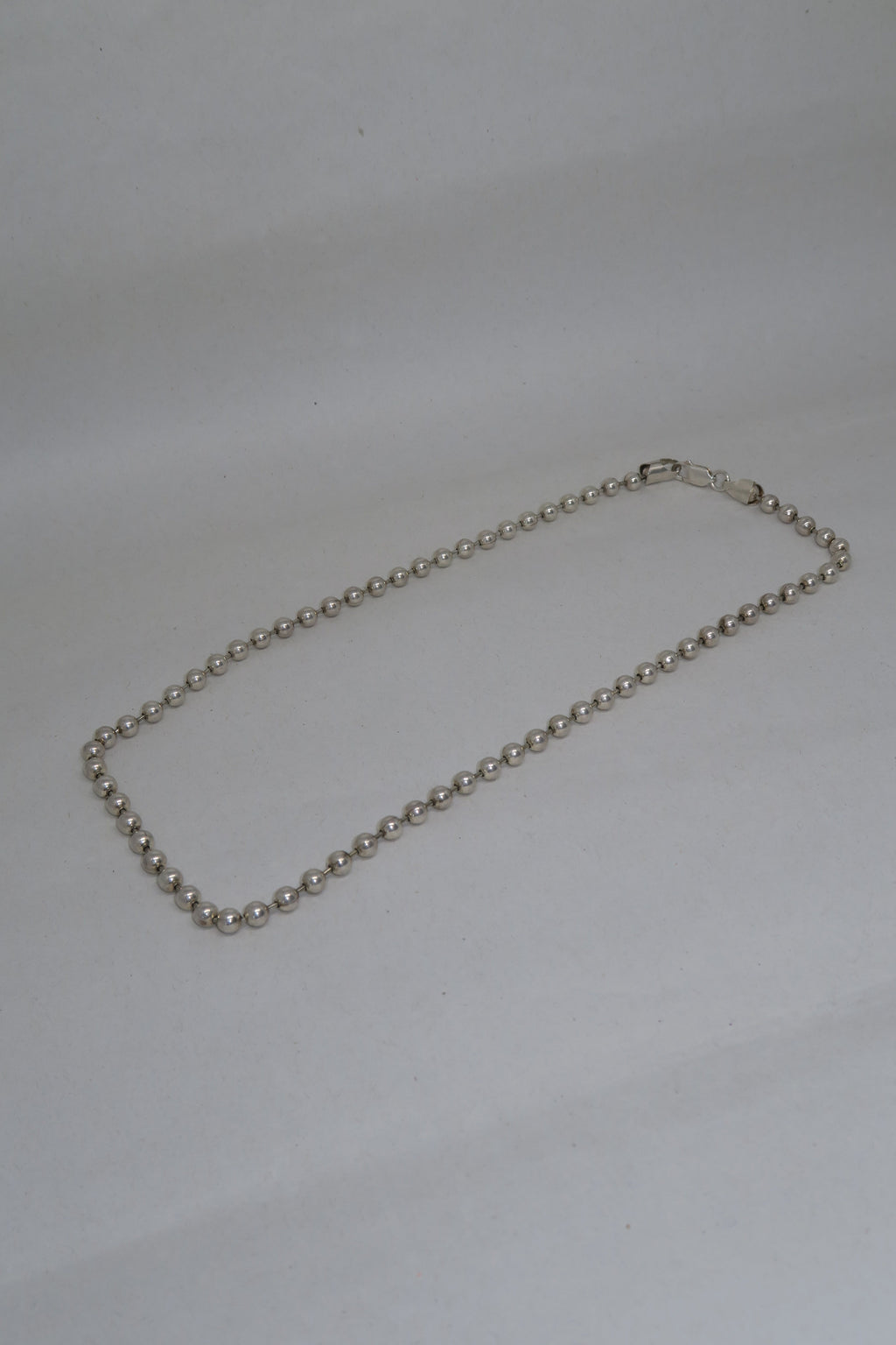 Spherical String Chain