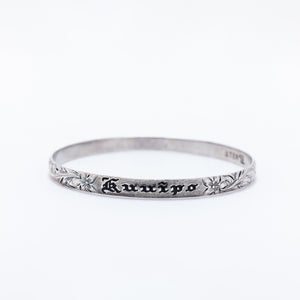 Kuuipo Bangle in Black Enamel and Plumeria