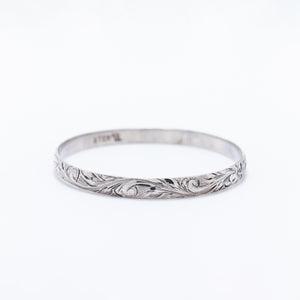 Kuuipo Bangle in Black Enamel and Plumeria