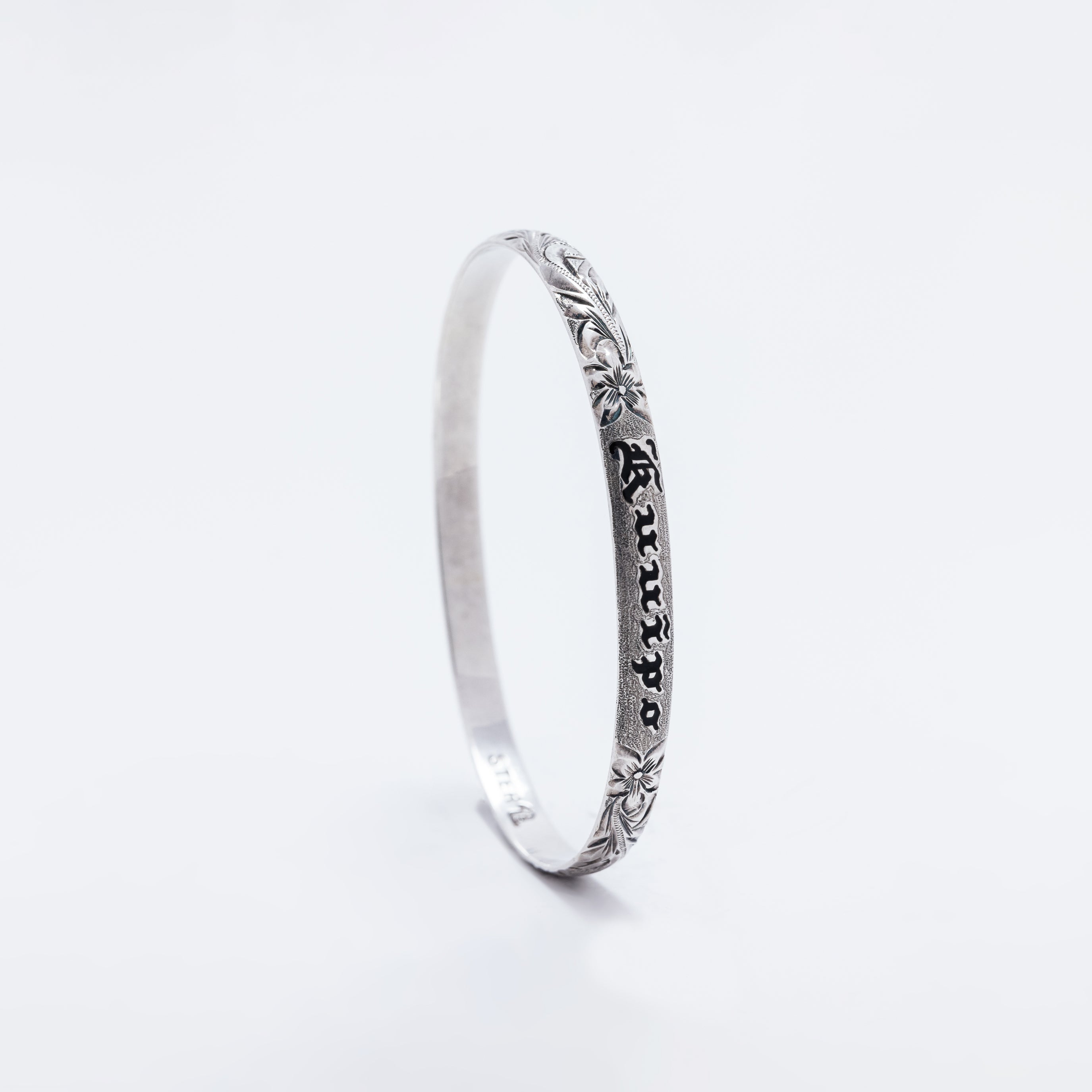 Kuuipo Bangle in Black Enamel and Plumeria