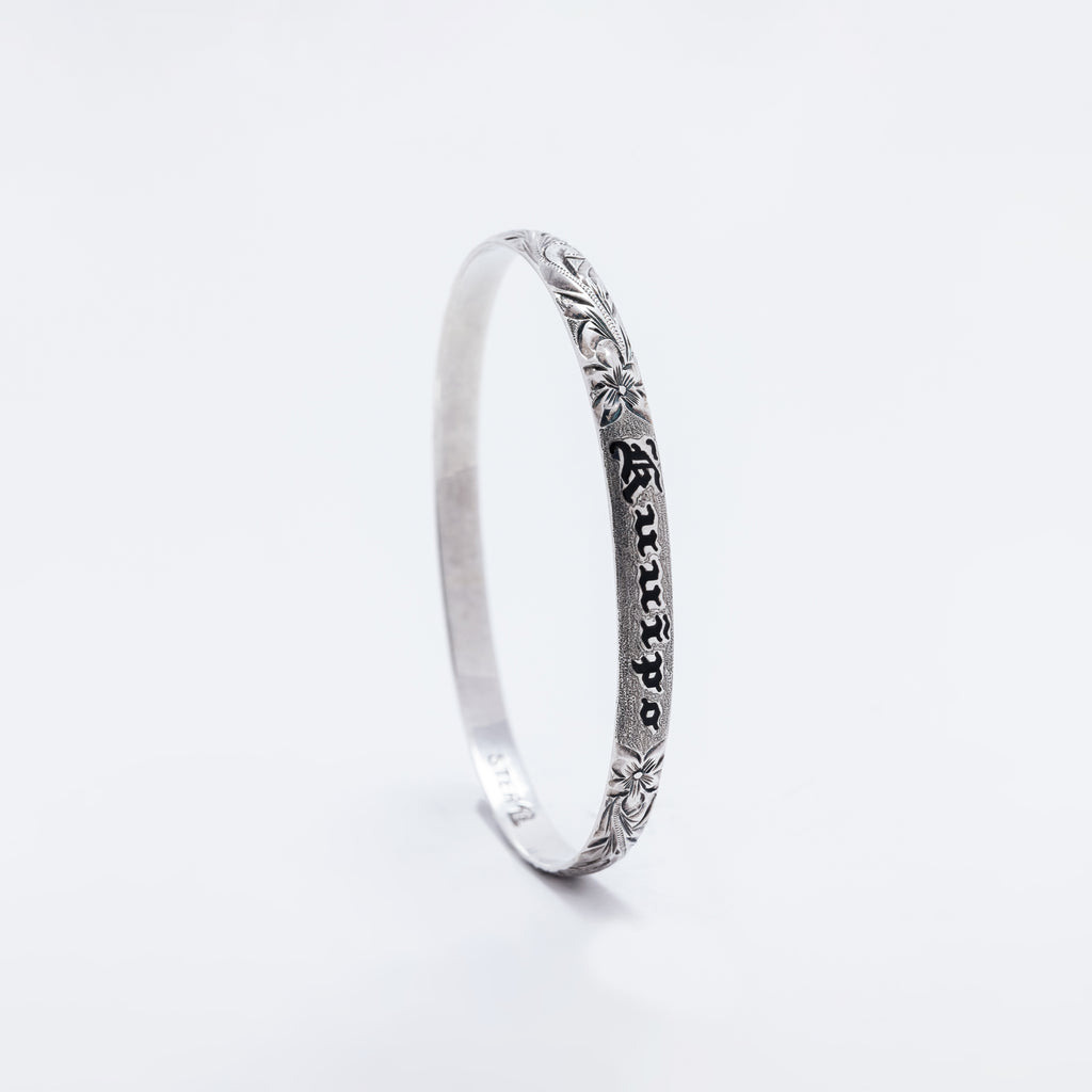 Kuuipo Bangle in Black Enamel and Plumeria