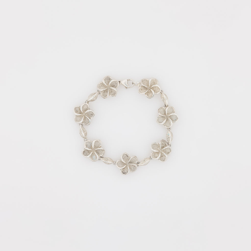 Seven Plumeria with Maile Leaves Bracelet