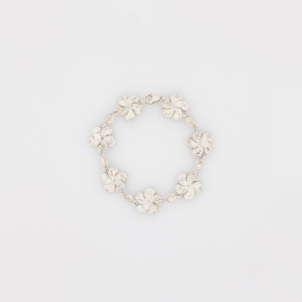 Seven Plumeria with Maile Leaves Bracelet