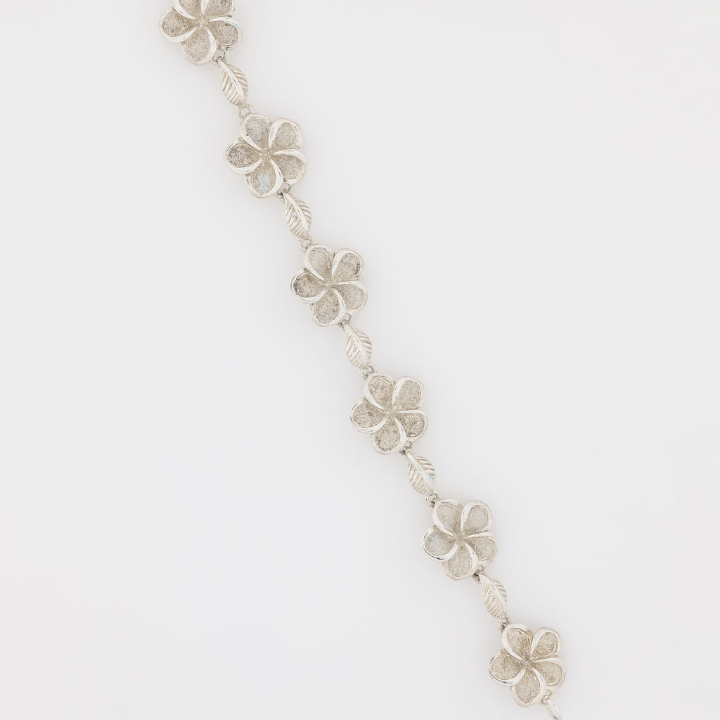 Seven Plumeria with Maile Leaves Bracelet