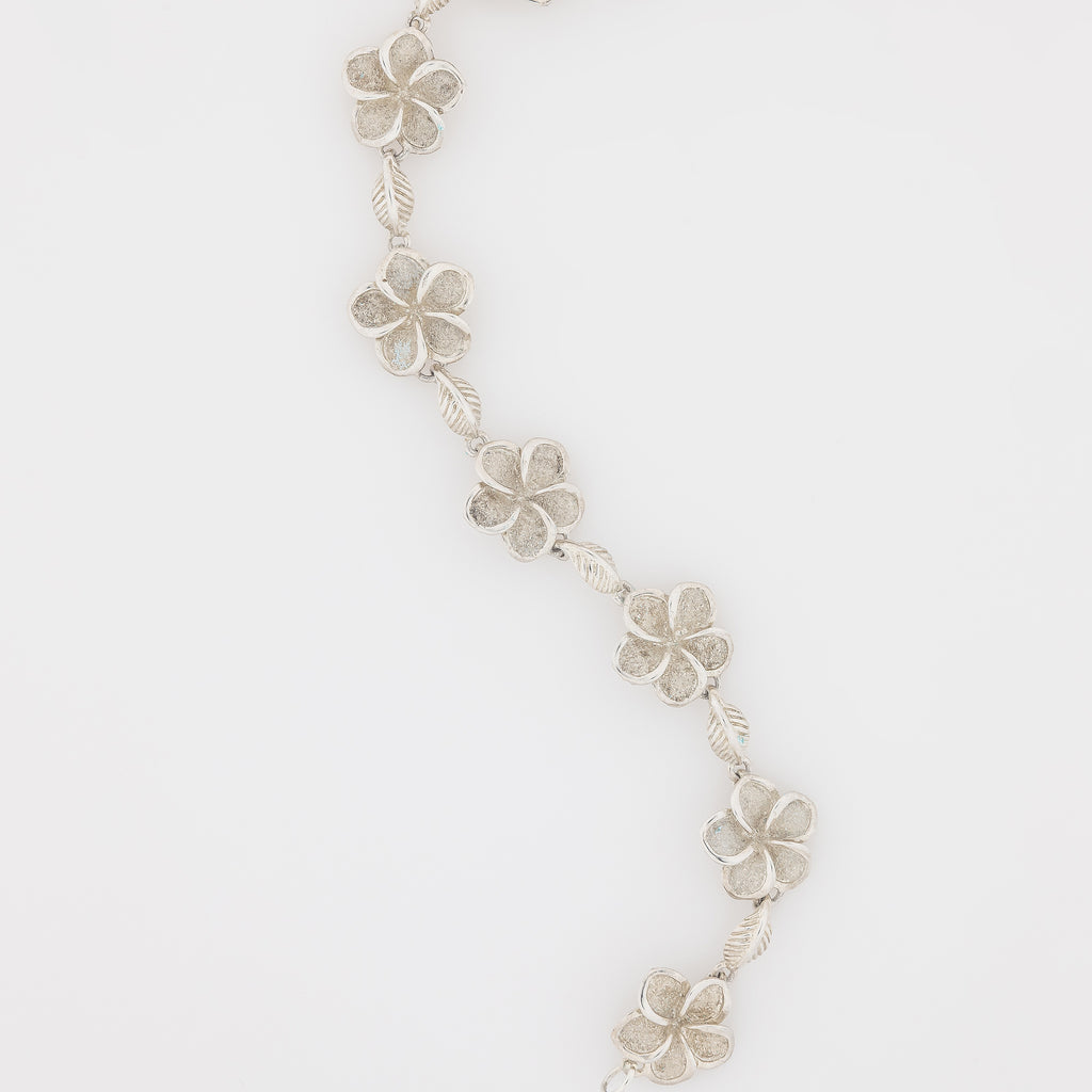 Seven Plumeria with Maile Leaves Bracelet