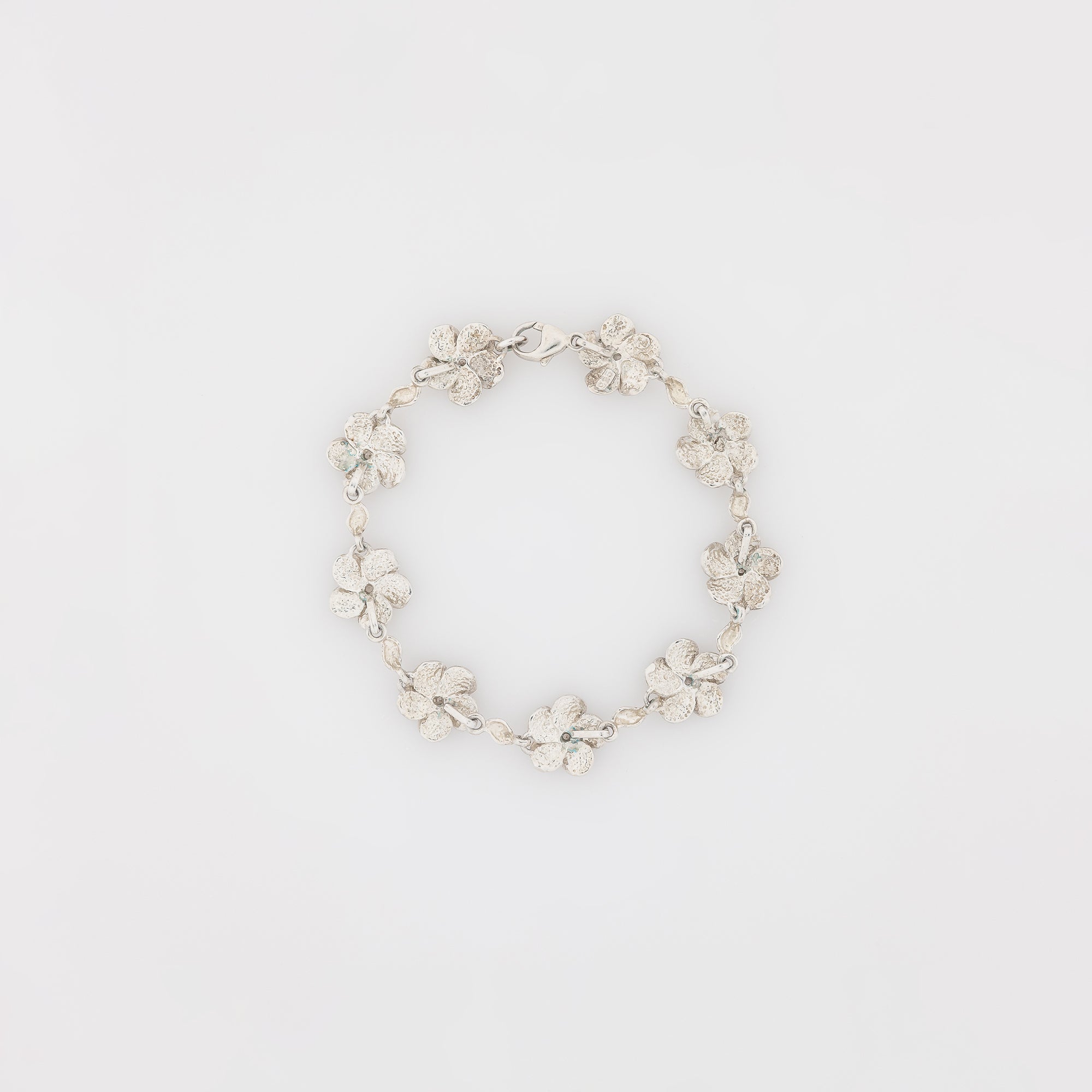 Eight CZ Plumeria with Maile Leaves Bracelet
