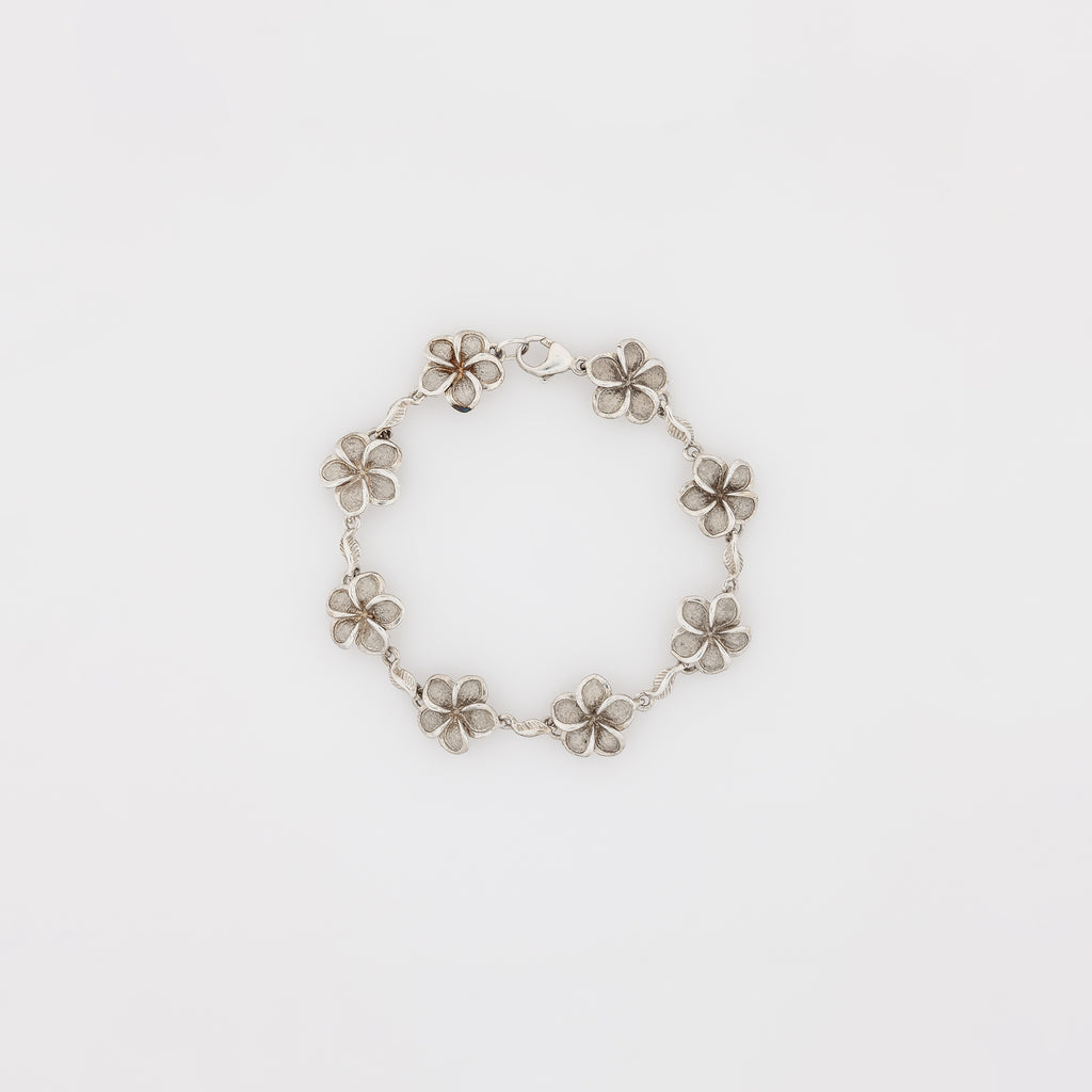 Eight Plumeria with Maile Leaves Bracelet