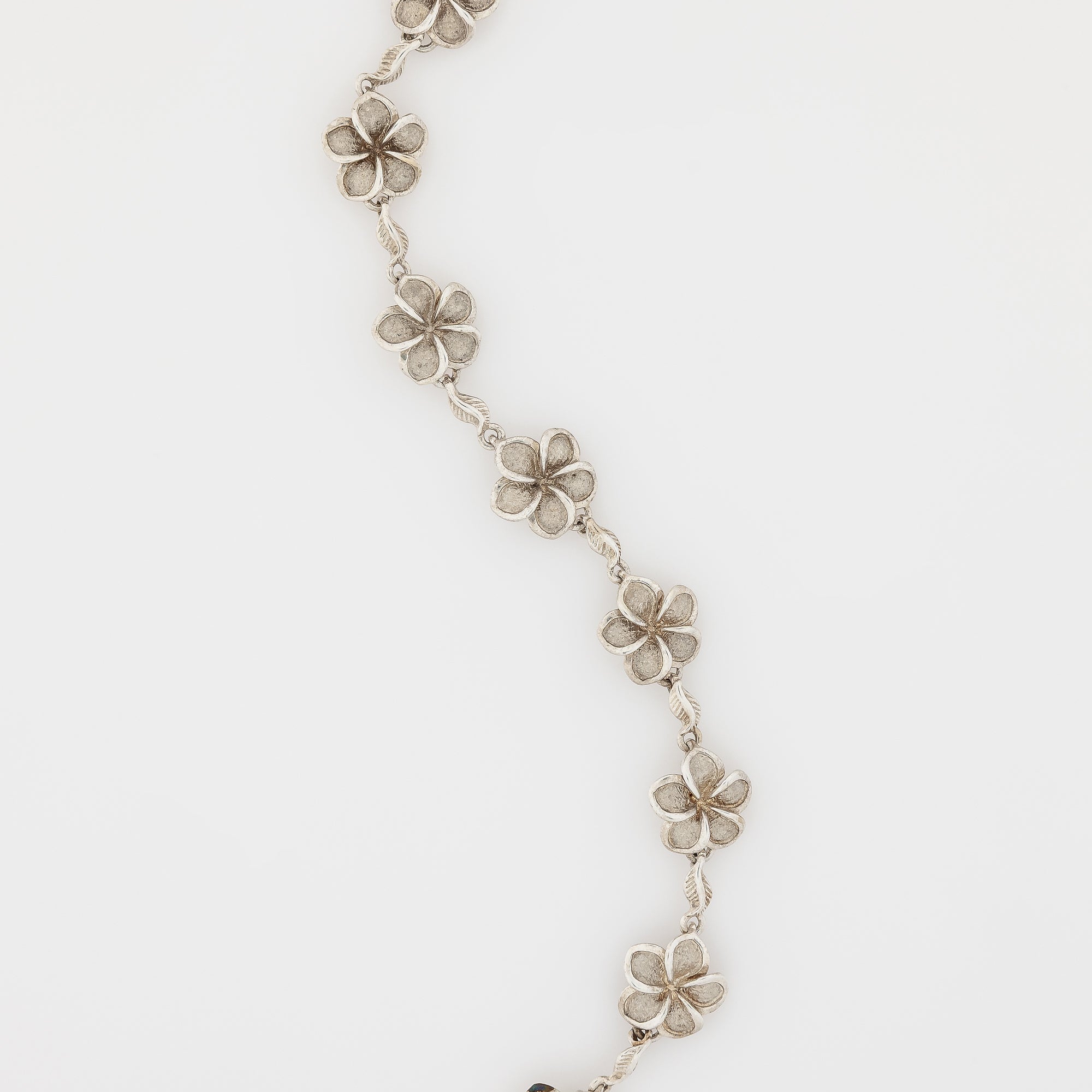 Eight Plumeria with Maile Leaves Bracelet