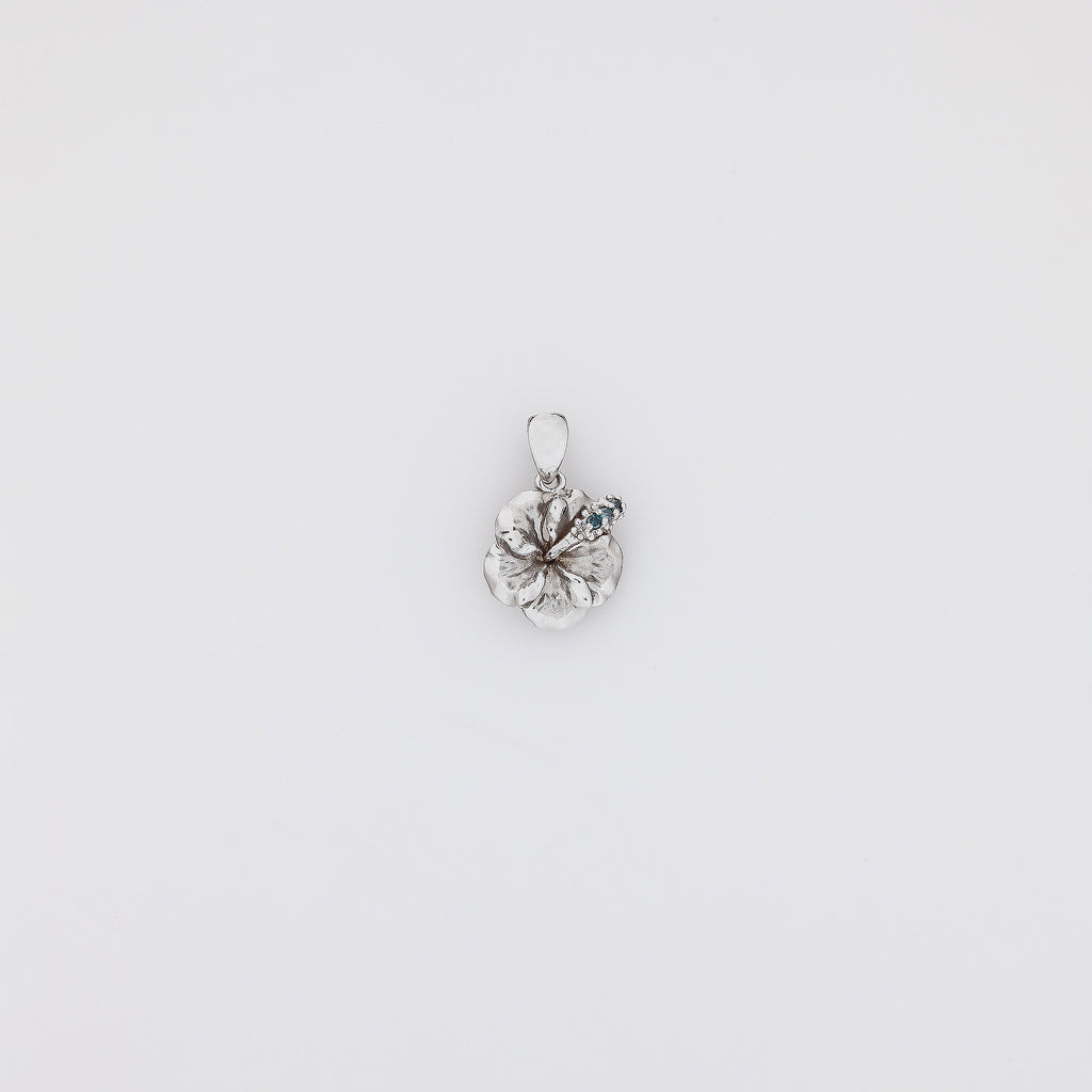 Blue Diamond Hibiscus Pendant in White Gold